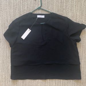 White space plus size top in black perfect for work!
